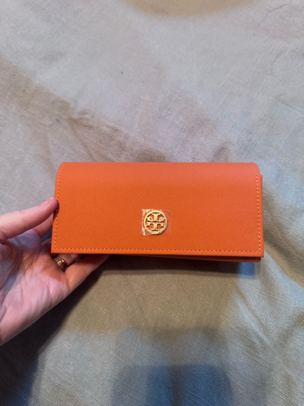 Tory Burch orange glass case